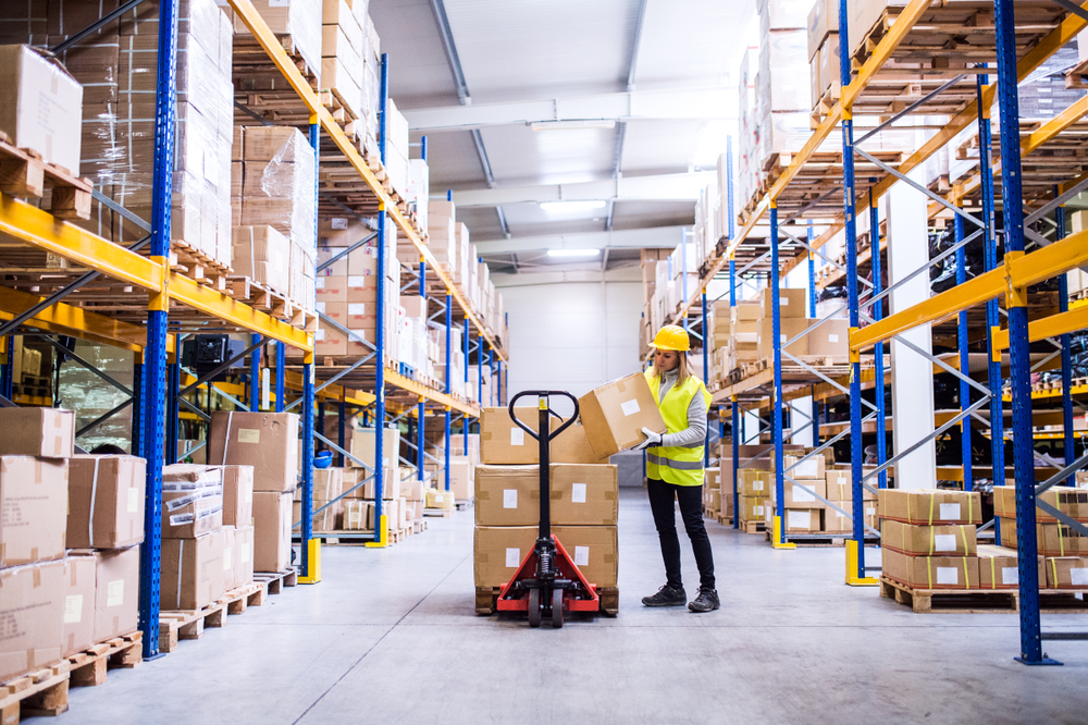 employee working in a domestic freight shipping company warehouse