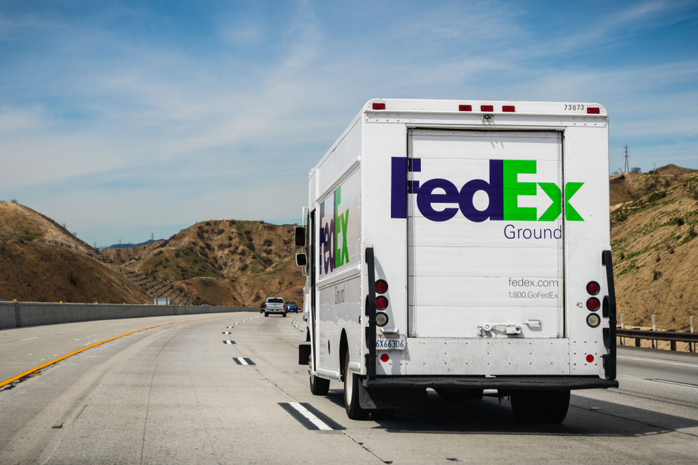 FedEx truck driving down highway delivering for 3pl fulfillment